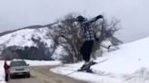 Teenager Doesn't Have Enough Speed To Ski Jump Across Road