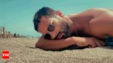 Shahid Kapoor shares a photo 'chilling' on a beach from his vacation with Mira Rajput; fans REACT - See photo | - Times of India