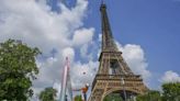 Beach volleyball at Eiffel Tower stadium draws the crowds looking for the perfect social media post