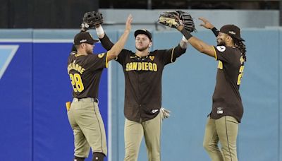 Dodger Stadium fans toss balls and trash on field, interrupt Padres’ 10-2 win that evens NLDS