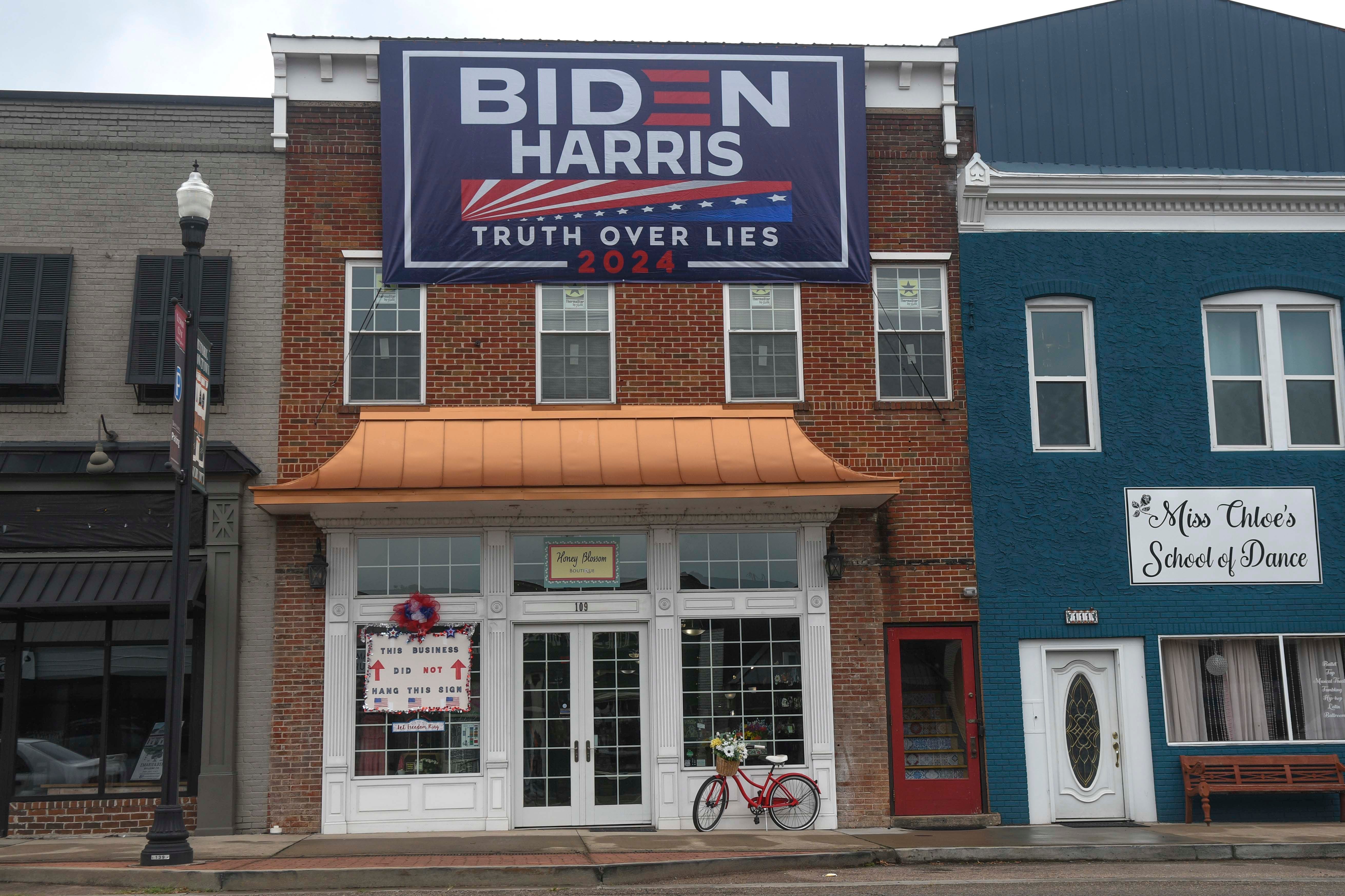 Lenoir City shop owner didn't ask for this massive Biden sign, and there's not much she can do