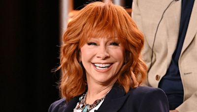 Reba McEntire Reveals She’ll Sing In ‘Happy’s Place’; Theme Song In Works