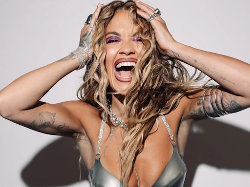 Rita Ora wows in silver bra and pink bikini bottoms at festival