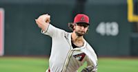 D-backs hang on to edge Nats