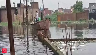 Moradabad: Severe flooding in people city; people forced to use boats to commute - The Economic Times