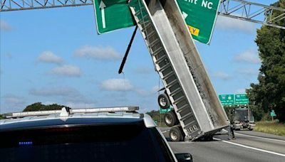 Tractor trailer crash causes delays on I-64