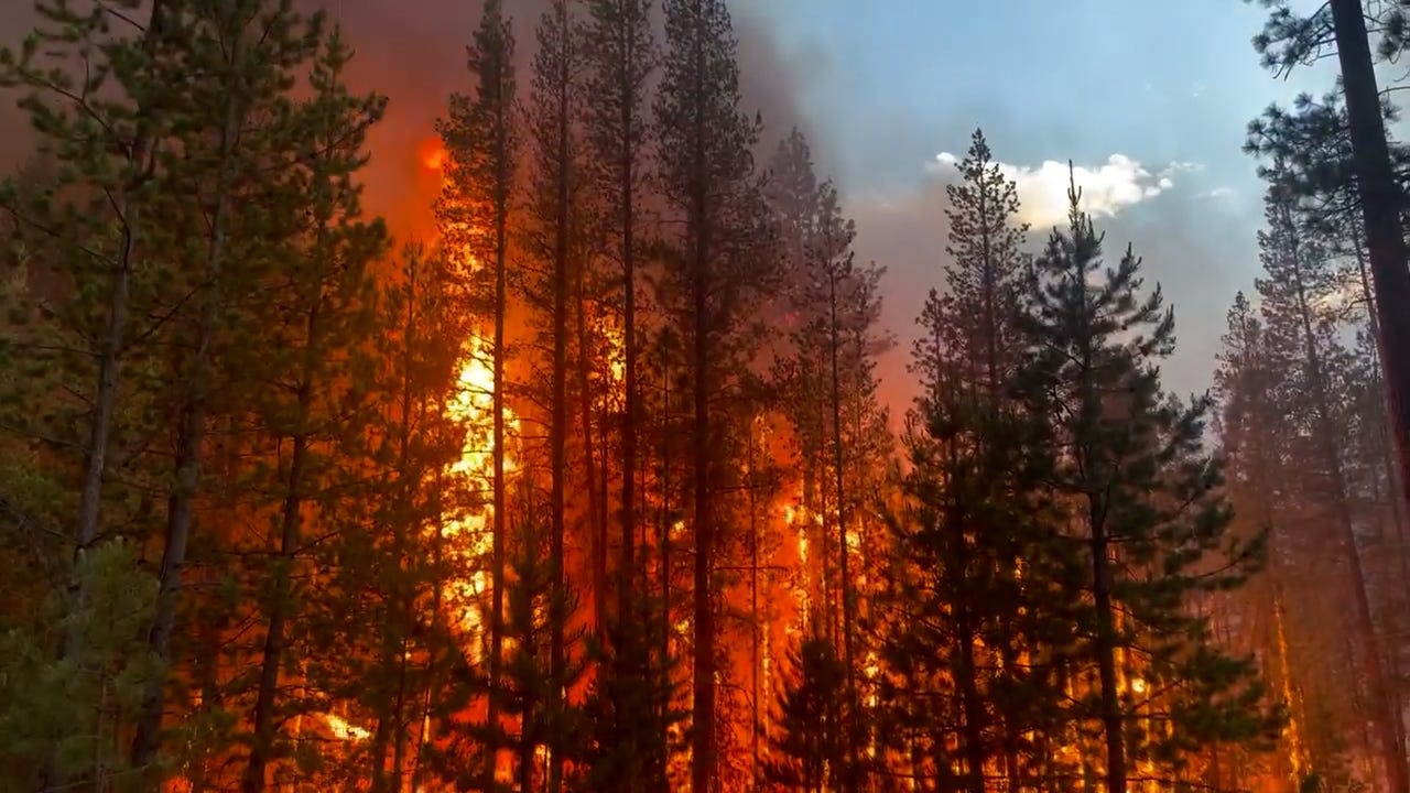 Wildfires rage across three states as evacuations, searches continue