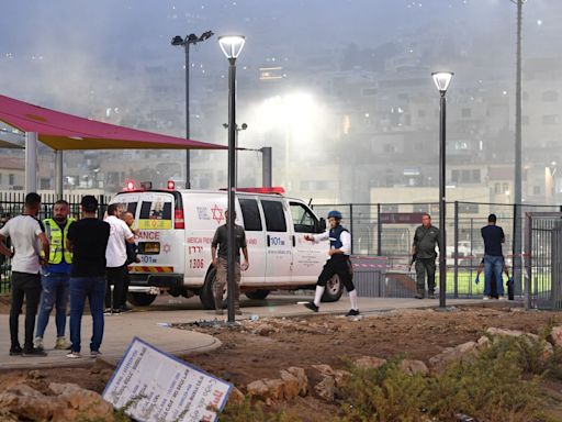 Israeli rescue official says at least 10 people killed in rocket attack on football pitch in Israeli-occupied Golan Heights