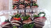 Valentine gift-givers dipping into chocolate-covered strawberries this year