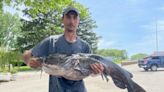 Man pulls in record-breaking 53.35-pound flathead catfish from Michigan river
