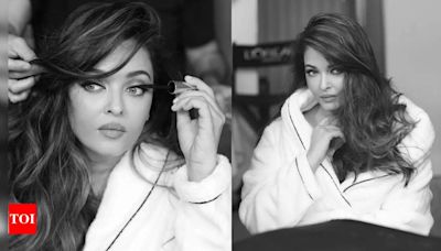 Netizens react as Aishwarya Rai Bachchan sets the internet on fire with BTS pictures from Cannes in a robe: 'She should have gone on the red carpet like this' | Hindi Movie News - Times...
