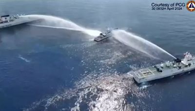 Chinese water cannon damages ship in new South China Sea flare-up, Philippines says