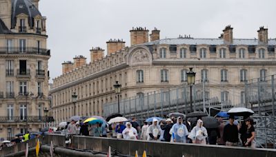 Paris barricades start to come down after opening ceremony on the Seine, but many still struggling