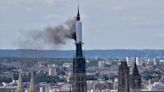 Rouen cathedral spire in northern France catches fire, firefighters working to control blaze