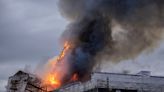 Fire engulfs Denmark’s historic stock exchange building, iconic spire collapses