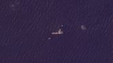 Satellite photos show US Navy ship building floating pier for Gaza aid as Israel-Hamas war rages