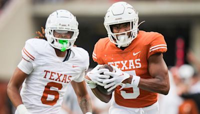 What are the key position battles for Texas Longhorns football as summer practices begin?