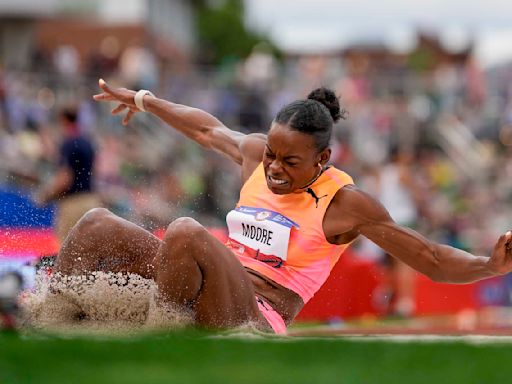 Olympic history for Jasmine Moore. She's the 1st US woman to qualify for triple and long jump