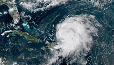 Ernesto grows into Cat 2 hurricane as it aims for Bermuda, leaving many in Puerto Rico without power