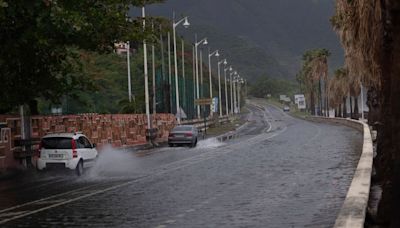 Ernesto nears hurricane strength as it knocks out power and floods Puerto Rico and the Virgin Islands