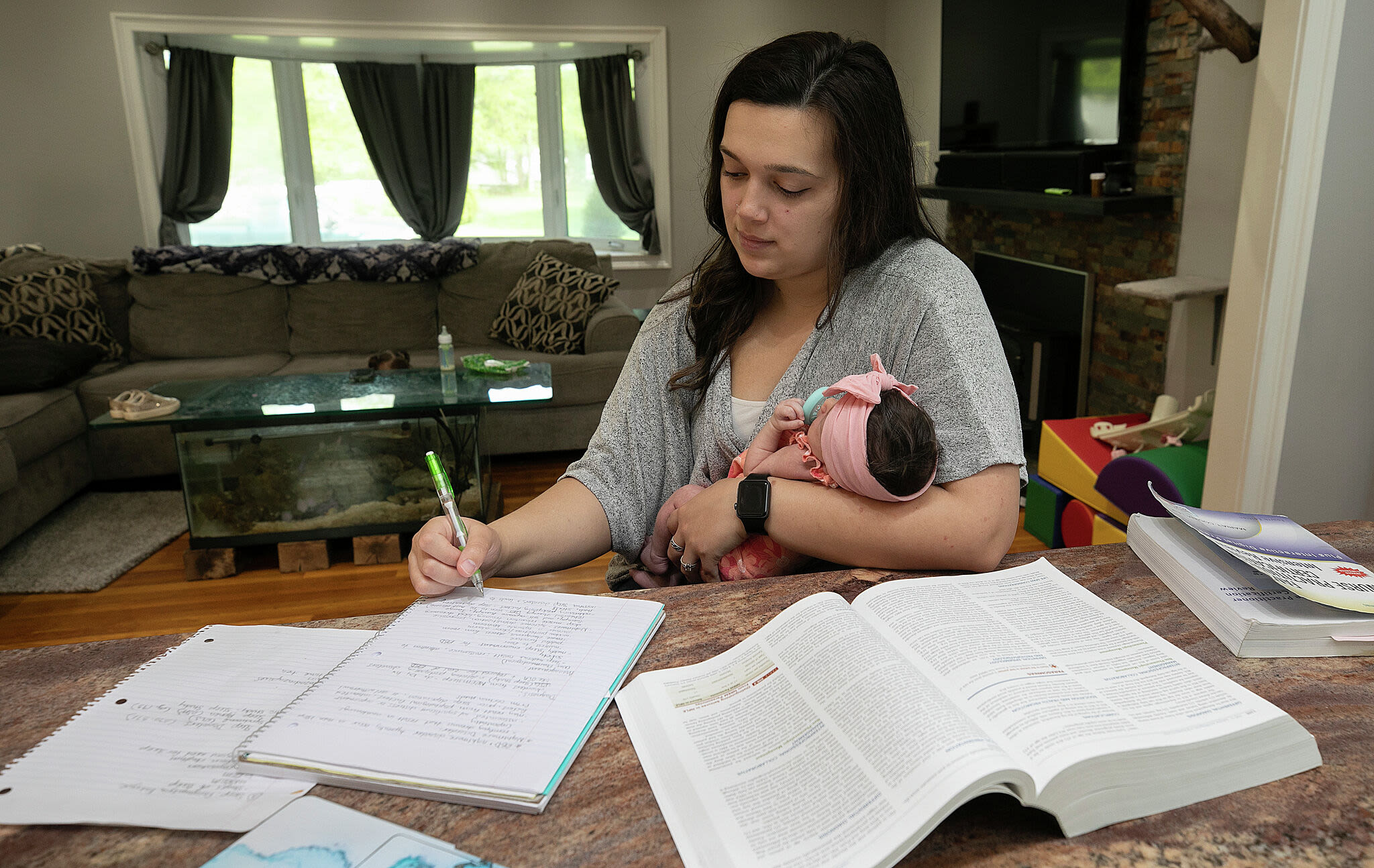 CT mom who gave birth twice while earning her Quinnipiac nursing degree graduates on Mother's Day