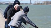 Flower toss held along St. Clair River in memory of victims of violent crime