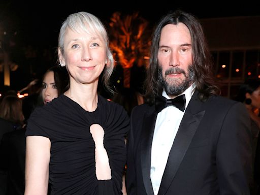 Keanu Reeves and Girlfriend Alexandra Grant Enjoy Rare Outing at Motor Sport Event