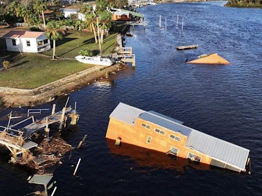 Hurricane Helene kills at least 44 and cuts a swath of destruction across the Southeast US