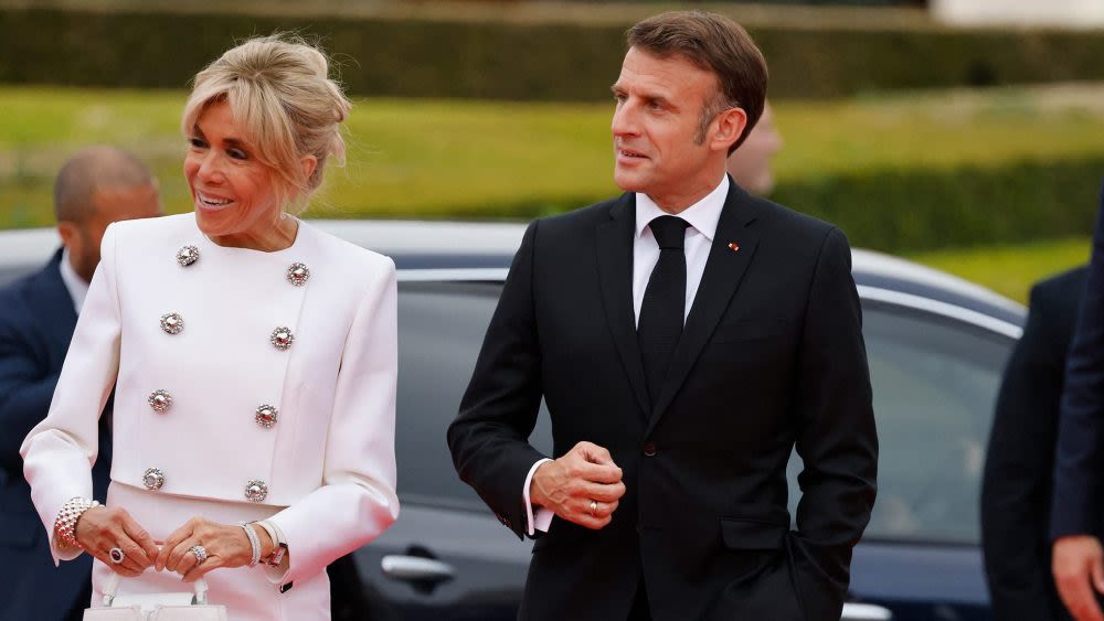 French First Lady Brigitte Macron Suits Up in Louis Vuitton Cropped Jacket and Skirt at Olympics Kickoff Gala in Paris