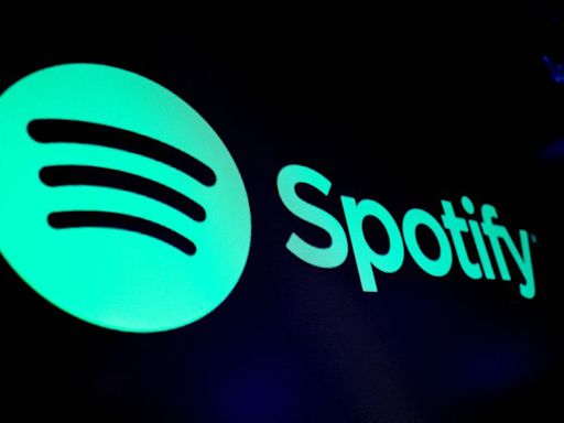 Spotify reports record quarterly earnings, shares jump 14% in premarket trade