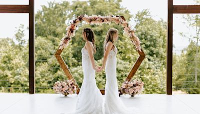 See couple react when they realize they are wearing the same wedding dress