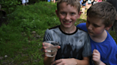 Camden students release brook trout into Mad River