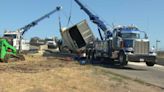 Overturned big-rig causes traffic mess at 101-880 interchange in San Jose