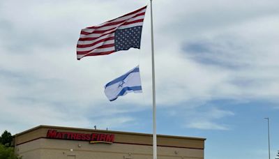 Milford businessman flew the American flag upside-down because U.S. is 'in distress'