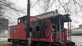 Alliance firefighters investigating blaze that damaged the Main Street Caboose