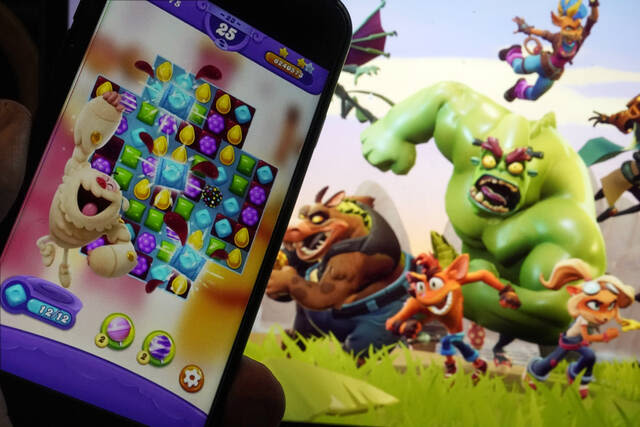 Pa. priest accused of stealing $40K for Candy Crush, other phone games