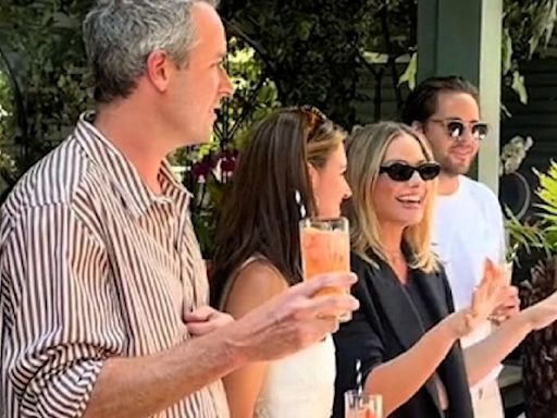 Margot Robbie buys entire restaurant a drink as she seemingly confirms pregnancy