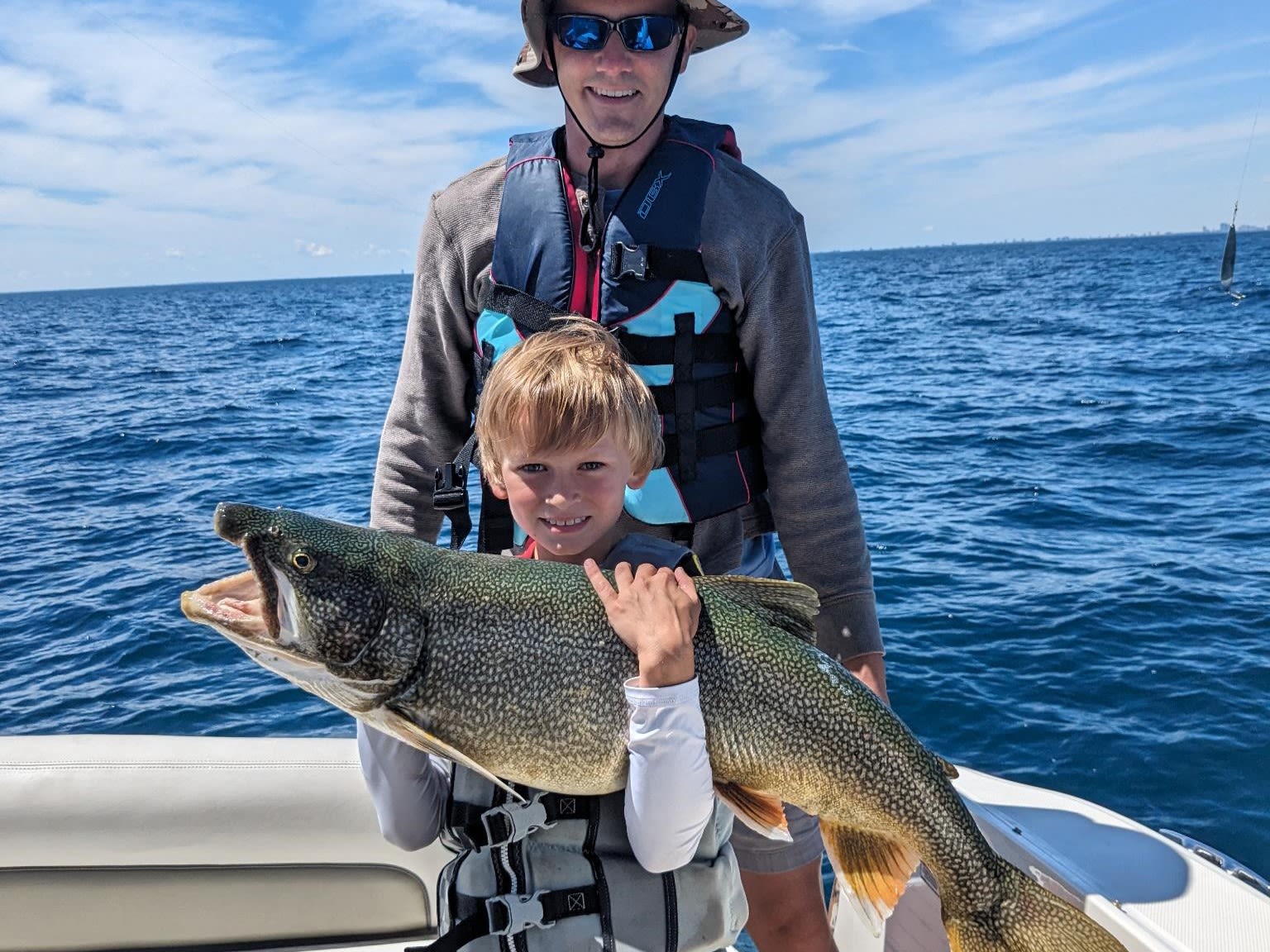 A young man catches lots of big fish, even landing one on a busted rod