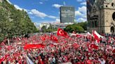 Turkey fans make controversial gesture before QF