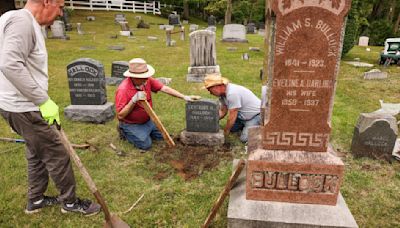 Sprucing up gravestones dating back to 1800s at Smithtown cemetery
