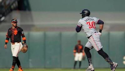 Carlos Santana homers to break 6th-inning tie, the Twins beat the Giants 4-2