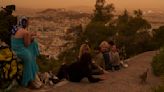 Martian skies over Athens? Greece's capital turns an orange hue with dust clouds from North Africa