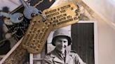 Photos, dog tags, and documents that belonged to World War II combat photographer Richard Taylor, who was on Omaha Beach on D-Day in 1944