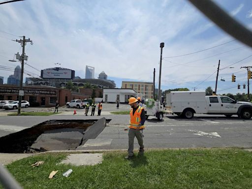 Sinkhole opens in uptown Charlotte road, see photos of the damage