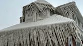 Photos show a Buffalo restaurant covered in giant icicles that reach from the roof to the ground as parts of New York continue to reel from the blizzard