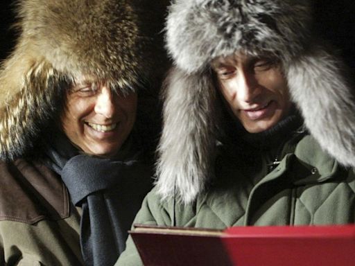 ‘An exceptional meal’: Vladimir Putin cut out a deer’s heart, presented it to Silvio Berlusconi