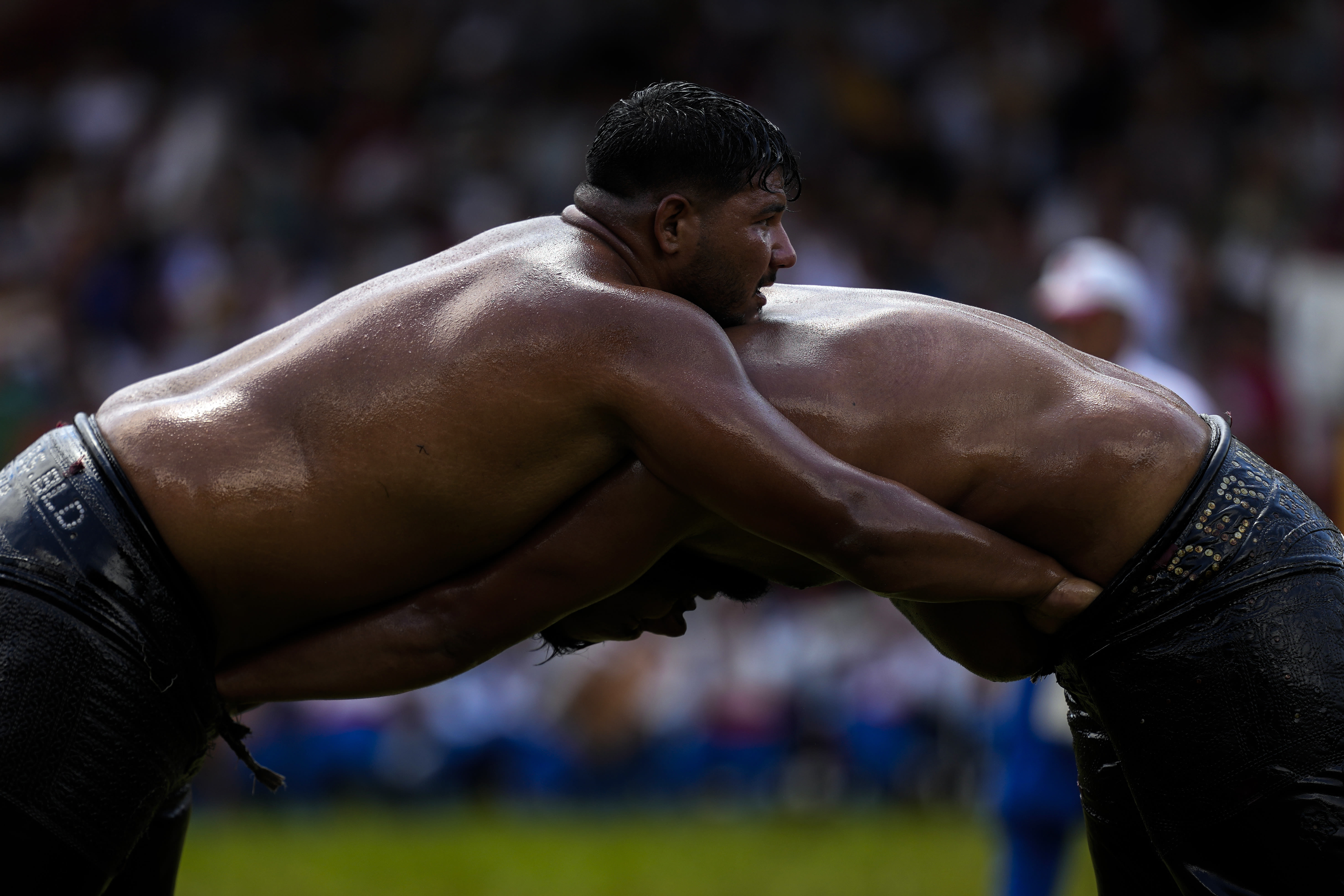AP PHOTOS: Oil wrestlers battle for the title in a more than 600-year-old competition in Turkey