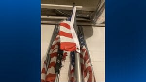 Dozens of American flags hung along Uniontown street torn down