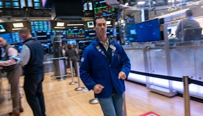 Wall Street termine en ordre dispersé, records pour Nasdaq et S&P 500