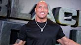 Dwayne Johnson visited the 7-Eleven where he used to steal Snickers bars as a kid and bought everyone's groceries